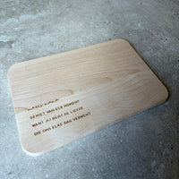 Houten broodplank met spreuk