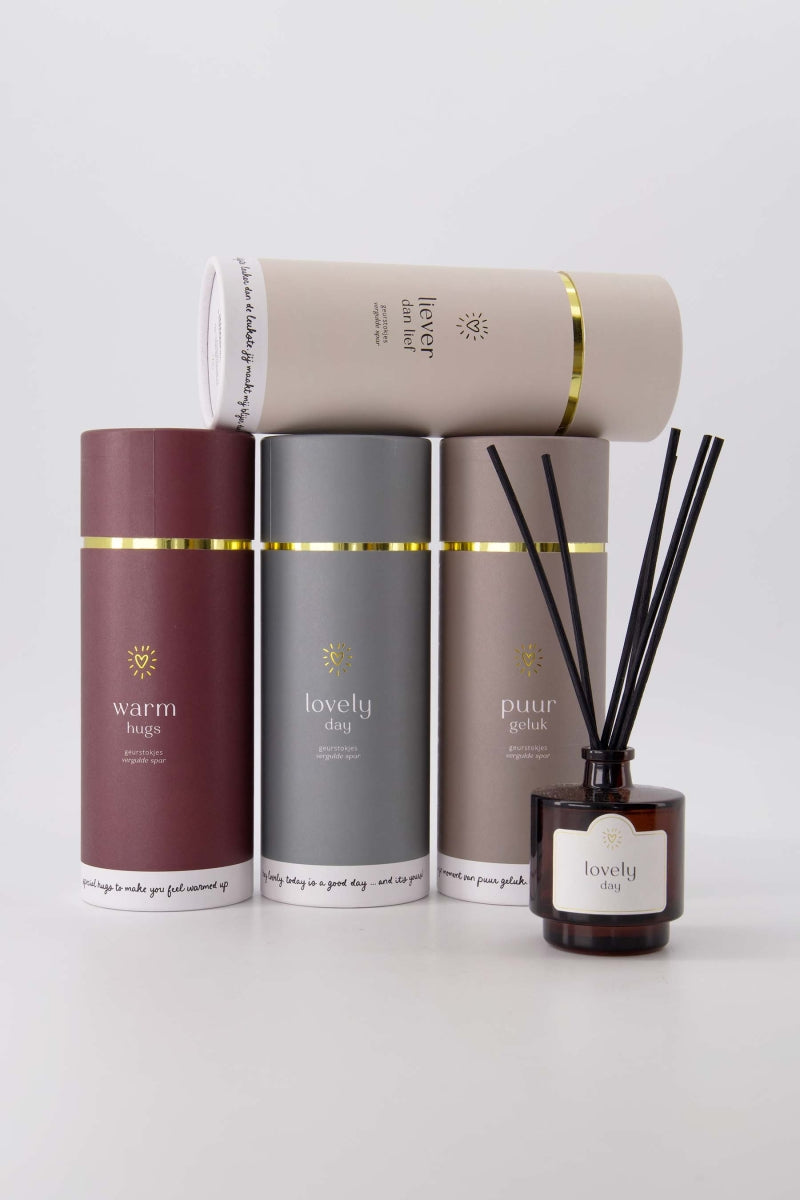 Geurstokjes in koker 'warm hugs'