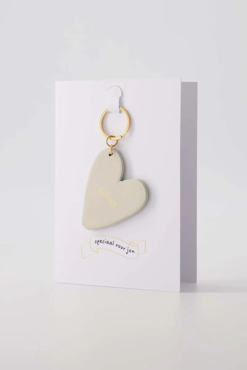 Wenskaart sleutelhanger geniet